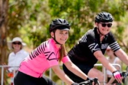 Two cyclists riding through Adelaide, South Australia