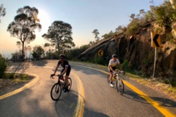 Cyclists riding through Australian Alps