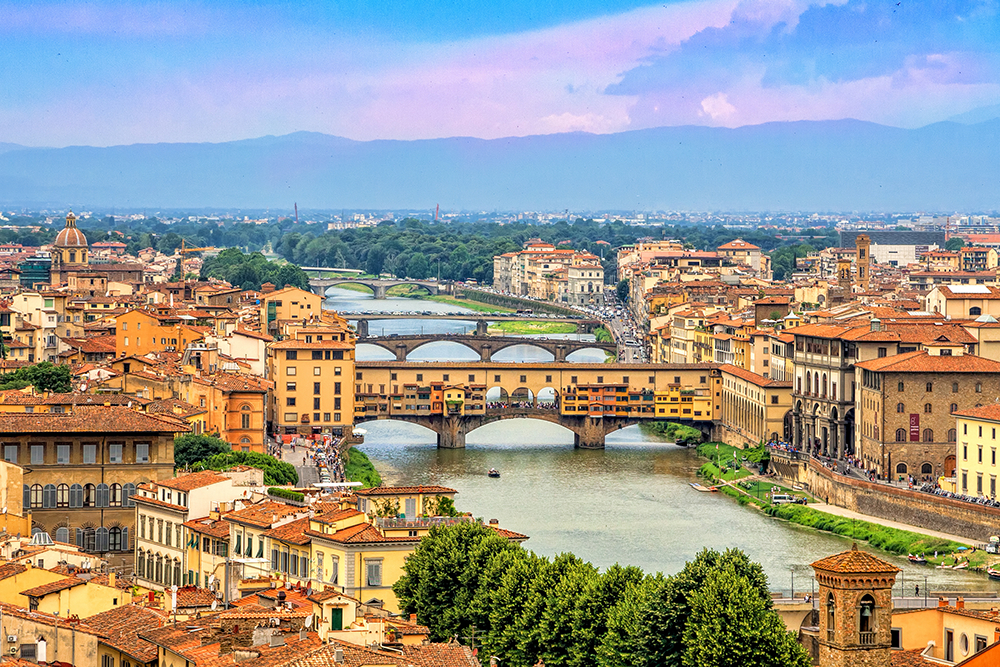 Ponte Vecchio, a medieval stone bridge over the Arno river in Florence, Tuscany, Italy.
